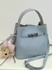 Bolso Cubo de Mano de Nicho Estilo Coreano para Mujer 2026 Primavera Nuevo Moda Bolso de Hombro Único Bolso Cruzado Simple de Alto Valor