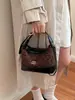 Bolso vintage de gamuza de nicho para mujer, bolso cruzado versátil y elegante con cadena acolchada, bolso de hombro y axila de moda con bloques de color