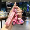 Lindo llavero de Sanrio con colgante de muñeco de dibujos animados para coche, accesorios para bolso, adornos colgantes, pequeño regalo al por mayor
