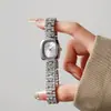 NAIDU Nuevo Elegante Estilo Coreano Nuevo Producto Elegante Pequeño Dorado Reloj de Dama Estilo Femenino Nicho Más Vendido Alto Valor de Apariencia