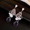 Pendientes de mariposa calados con circonita, estilo francés, aguja de plata, lujo ligero, alta gama, pendientes exquisitos, diseño moderno y versátil