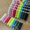 Precio de Fábrica Venta Directa Hilo de Poliéster 402 Hilo de Costura Casero Hecho a Mano Eje Pequeño Talla 50 10 Colores Línea de Placa Recubierta Línea de Color Fijo