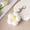 Colgante de borla de flor de felpa de color creativo para llavero, accesorios de coche, colgante de bolsa al por mayor, estilo pequeño y fresco