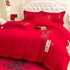 Juego de cuatro piezas de bordado de boda de algodón brillante y amigable con la piel al por mayor, juego de ropa de cama de boda estilo chino