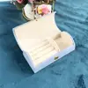 Caja de Joyería Pequeña Arqueada Portátil para Viaje de Venta Caliente Transfronteriza, Caja de Almacenamiento de Joyería de Terciopelo con Perlas, Caja de Empaque de Joyería de Moda