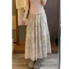 Saia floral francesa vintage rosa e branca para mulheres, verão 2026, elegante e doce, modeladora, saia plissada em A estampada