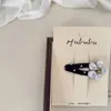 Grampo de cabelo infantil com design de bolinhas onduladas preto e branco e flor de cerejeira, presilha lateral, clip BB