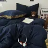 2026 Novo Estilo Simples Estilo Retrô Algodão Lavado Conjunto de Quatro Peças Capa de Edredom Lençol de Cama Conjunto de Três Peças para Dormitório de Estudante