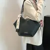 Bolsa Tote Retrô de Grande Capacidade Clássica Nova Verão 2025 Bolsa de Ombro com Textura de Alta Qualidade Versátil para o Dia a Dia Bolsa de Braço