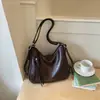 Mochila de gran capacidad para mujer Shuai Mi Jia 2026 verano nuevo casual de alto valor para el trabajo bolsa de mano simple