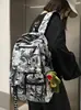 Mochila Escolar 2026 Novo Estilo Mochila com Grafite de Desenho Animado para Meninos do Ensino Fundamental, Mochila de Nylon Tendência de Grande Capacidade