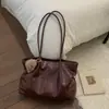 Bolso tote vintage de gran capacidad transfronterizo para mujer, nuevo modelo 2026, bolso de mano versátil de nicho casual para el hombro