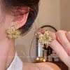 Pendientes Dorados Florales Retro para Mujer 2026 Nuevos Pendientes de Diseño de Nicho Únicos Modernos Elegantes Exquisitos