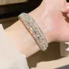 Pulseira Aberta Dupla Camada Borboleta com Zircônia Suave e Atmosférica para Mulheres, Joia Versátil de Luxo Leve de Nicho para o Dia a Dia com um Toque de Alto Padrão