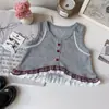 Conjunto de Tres Piezas para Niña Primavera y Otoño 2026, Nueva Camisa de Manga Larga Estilo Coreano, Chaleco de Punto con Encaje y Falda para Venta Transfronteriza