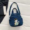 Bolsa Jeans Lavada Bordada Resistente Fofa para Estudante Modelo Novo 2026 Estilo de Alta Qualidade Duas Alças Ombro Única Transversal Tendência