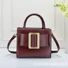 Bolsa de metal casual transfronteiriça para mulheres, nova bolsa clássica de moda 2025 para o dia a dia com fivela grande dourada, bolsa de ombro e transversal para mulheres