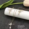 Conjunto de pendientes y collar Xuping estilo vintage de nicho europeo y americano transfronterizo, conjunto de joyería elegante de aleación de cobre, venta al por mayor y hecho a medida