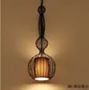 Nueva jaula de pájaros de hierro estilo chino lámparas de cafetería bar araña de escalera de restaurante de té creativo americano Iluminación noble