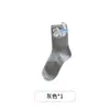 Otoño 2025 Nuevos Lindos Calcetines Holgados Estilo Coreano de Felpa Gatito Calcetines de Media Pantorrilla Calientes de Dibujos Animados con Moño para Mujer