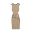 Estilo puro e sedutor, decote redondo, design sem mangas, acinturado, que molda o quadril e com detalhe cruzado, este vestido de outono é um vestido maxi que valoriza a silhueta, com fenda nas costas para um look sexy.