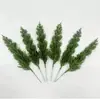 Suministro Especial Transfronterizo Navidad PE Nuevo Estilo Árbol de Navidad Simulación 9 Ramas Agujas de Pino Ramas de Pino Arreglo Floral Adorno de Escritorio Decoración