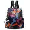 Comercio exterior mochila de moda popular femenina 2024 moda coreana todo partido tela Oxford mochila antirrobo bolsa femenina con colgante
