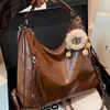 Mochila vintage, novo modelo transfronteiriço, bolsa de ombro estilosa para o dia a dia, bolsa tote crossbody, bolsa de mão casual de grande capacidade, versátil e moderna