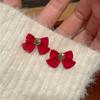 Pendientes de lazo rojo para mujer, otoño e invierno 2024, nuevos pendientes de nicho, elegantes y con un toque de estilo.