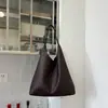 Bolso de mano tejido de lujo ligero de alta gama, nicho, para mujer, nuevo estilo 2026, moderno, popular de verano, para ir al trabajo, bolso de hombro único, tote