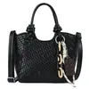 Bolso tejido de patrón vintage de nicho transfronterizo para mujer, nuevo bolso de hombro versátil de moda 2026, bolso cruzado simple