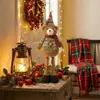 Comercio exterior transfronterizo al por mayor tela a cuadros navideña retro de copo de nieve muñecas retráctiles para decoración navideña de hoteles y centros comerciales