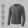 Camiseta de manga larga para hombre, capa interior de otoño para hombre, camiseta base elástica de corte holgado, camiseta estampada estilo coreano ins para hombre