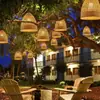 Nova luminária de cesta de bambu para exterior transfronteiriça, luminária pendente vintage tecida em bambu, luminária de cesta de bambu decorativa para camping em arte de rattan, luminária tecida em bambu atmosférica