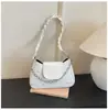 Bolso moderno de un solo hombro de color liso, diseño elegante y versátil, nuevo bolso cuadrado pequeño de alta gama para el día a día estilo francés, bolso de axila para mujer