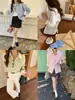 3ª Mañana Principios de Primavera Nuevo Estilo Estilo Coreano Elegante Botones en la Cintura Bordada Camisa Zy3814