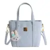 Bolsas de Lujo de Nicho en Relieve para Mujer 2025 Nuevo Otoño Bolso Cruzado Casual Bolso de Mano de Moda Elegante Bolso Cubo