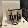 Bolso de paja de gran capacidad de moda 2023, nuevo bolso de cubo de estilo occidental simple, bolso de hombro de estilo occidental personalizado, bolso de mano