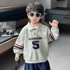 Camisa Polo para Niños Primavera y Otoño 2026 Nuevo Modelo Sudadera Estilo Universitario para Niños Pequeños con Estampado Digital Top Deportivo