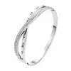 Selección transfronteriza de pulseras de acero inoxidable con diamantes, patrón romano de cruz anudada, joyería versátil de nicho para mujer