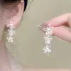 Pendientes de botón de flor hueca de plata, frescos y elegantes, para mujer, diseño único de nicho, lujo ligero, pendientes de alta gama y con estilo