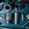 Venta al por mayor del fabricante Piezas de inyector de combustible para automóvil Piezas de automóvil Carcasa elástica de acero inoxidable 304 Carcasa elástica 305