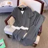 Conjunto Esportivo Casual de Verão para Mulheres 2026 Novo Elegante e Fashionável Estilo Coreano Falso Conjunto de Duas Peças Calça de Perna Larga Manga Curta