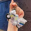 Llavero creativo de coche de policía y motocicleta de fricción, divertido juguete antiestrés para estudiantes, pequeño regalo para máquinas de garra, al por mayor