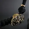 Colgante de cuchillo hecho a mano con calavera de Zhongkui de latón con paracord, colgante personalizado estilo europeo EDC para exteriores, colgante de llave DIY