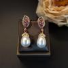 Elegantes pendientes de alta gama con forma de gota de agua blanca y plumas de diamantes de imitación rosas retro para mujer, otoño e invierno 2024, venta al por mayor