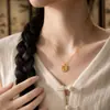 Colgante de candado Ruyi giratorio estilo chino para mujer, estilo palacio vintage, diseño de nicho, accesorio de cadena para clavícula versátil de lujo ligero