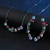 Estilo Europeu e Americano Novo temperamento pedra de vidro combinação de cores brincos brincos elegantes e joia de pingente conjunto de duas peças uma geração de cabelo