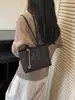 Bolsa pequeña 2026 nueva versión coreana linda bolsa de lunares bolsa de mano de nailon ligera bolsa cuadrada pequeña de un solo hombro