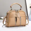 Bolsa Feminina 2026 Novo Estilo Coreano Elegante Simples Bolsa de Ombro Transversal Versátil Grande Capacidade Pequena Bolsa Quadrada de Mão para Mulheres